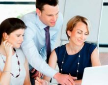 Office workers staring at computer The Pygmalion factor: Ensuring your employees’ success